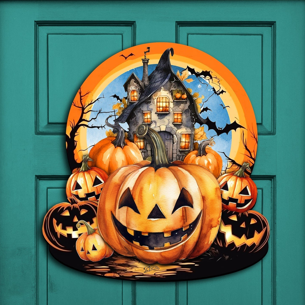 Halloween-themed door decoration with pumpkins and a haunted house on a teal door, surrounded by Christmas garland.