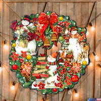 Snowman Christmas wreath door hanger with red bow and poinsettias.