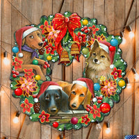 Decorative Christmas wreath with four dogs wearing Santa hats on a wooden background.