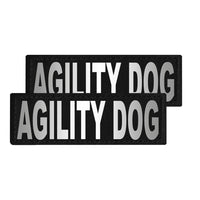 Two black patches with 'AGILITY DOG' text on a white background