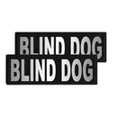 Two black patches with 'BLIND DOG' text on a white background