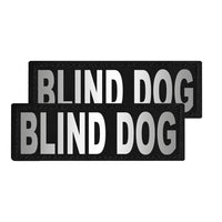 Two black patches with 'BLIND DOG' text on a white background