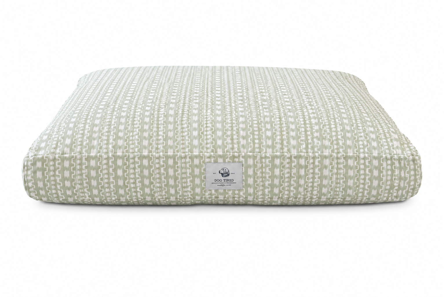 A rectangular pet bed with a textured, woven vertical stripe pattern in sage green and white, featuring a small white brand label on the front.