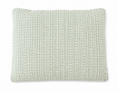 light green and white pet bed
