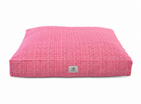A cat or dog bed with a red and white grid plaid in a classic preppy style on a white background