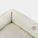 Furry Sleeper Dog Bed in Beige - Chester & Lee