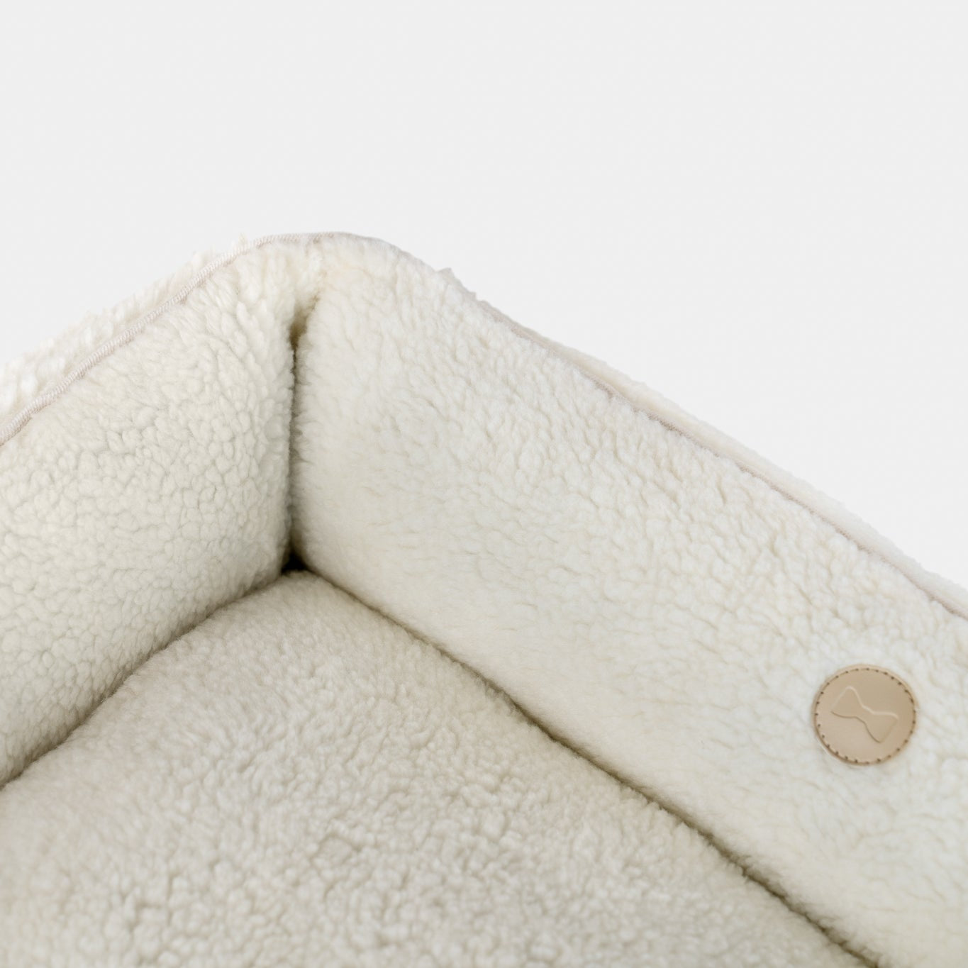 Furry Sleeper Dog Bed in Beige - Chester & Lee