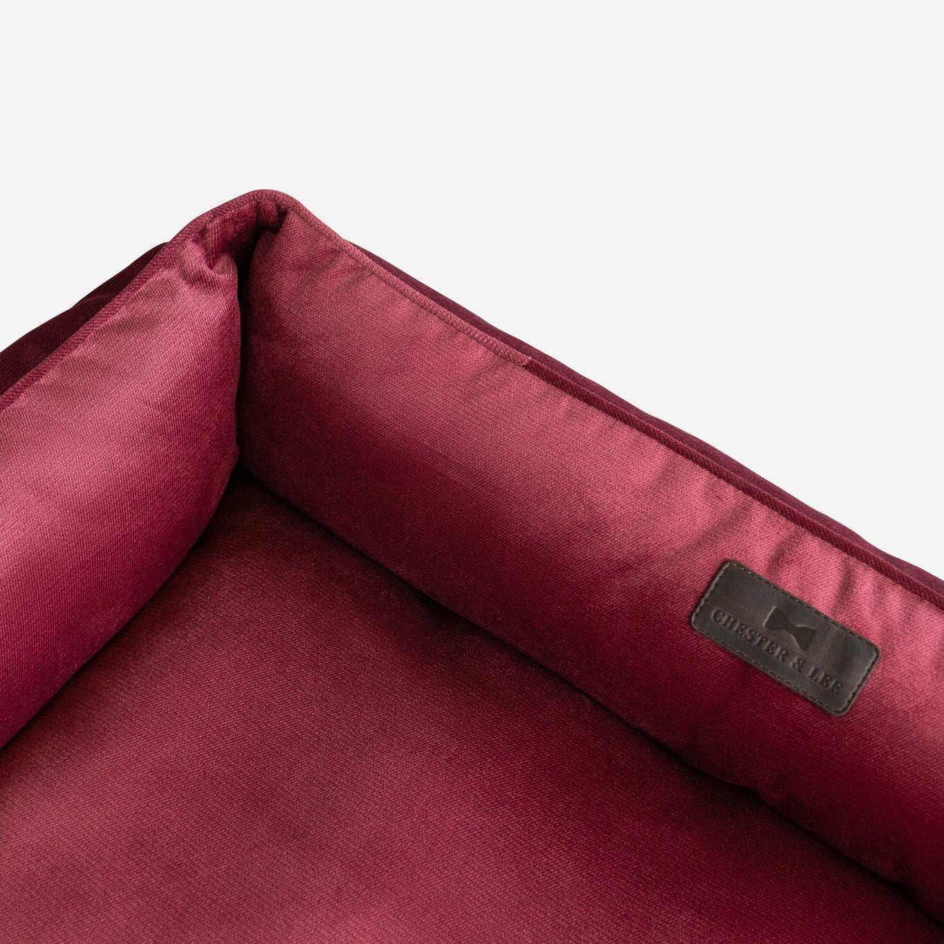 Vibrant Velvet Sleeper Dog Bed in Wine - Chester & Lee