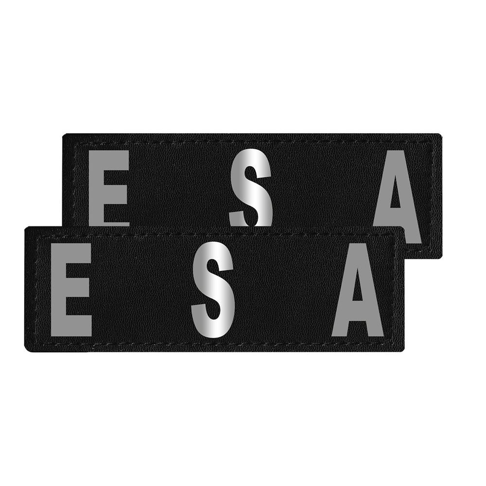 Two black patches with 'ESA' text on a white background