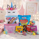 Cute unicorn-themed gift basket with Cotton Candy, m&Ms and Skittles on a decorative background for kids.