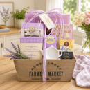Lavender Gift basket with Angelina’s Butter Tea Cookies (7oz.), Amaretti Cookies (0.9oz.), Snickerdoodle Cookies (2oz.), Assorted Fruit Slices (2oz.), Coffee Bean ; Tea Leaf English Breakfast Tea (0.14oz.), Ceramic Tea Caddy, Reusable Wood Crate