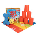 Colorful dog toys and game components on a mat with dog enrichment toy 'The Dog's Best Friend Game' box to increase the bond between dogs and their people.
