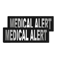 Two black medical alert patches with white text on a white background