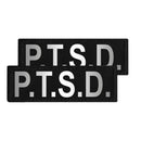 Two black patches with 'P.T.S.D.' text on a white background