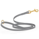 gray waterproof biothane cat or dog leash with gold colored brass snap clip that comes in widths of 1/2", 5/8" and 3/4" and is 6 feet long.