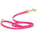 bubblegum pink waterproof biothane cat or dog leash with gold colored brass snap clip that comes in widths of 1/2", 5/8" and 3/4" and is 6 feet long.