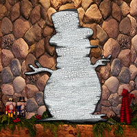 Rustic winter decoration of a Snowman with a distressed finish sitting on a rock mantel