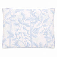 A rectangular cat and dog bed featuring a light blue botanical leaf pattern on a white background, shown against a plain white studio backdrop.
