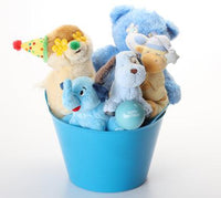 A blue plastic bucket filled with plush teddy bears and a small blue ball, photographed on a clean white background.