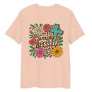 unisex organic cotton peach t-shirt with a Christian saying "simply blessed" on a floral, botanical, leopard print heart, and religious cross background
