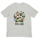 Light gray t-shirt with text "Dog Dad" in dark green with a camo print dog paw print for outdoorsy pet lovers.