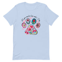 light blue unisex t-shirt with dog lover saying "All You Need is Love and a Dog" with floral paw print for dog moms