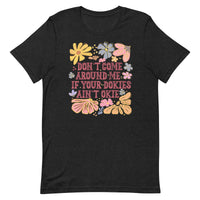 black women's t-shirt with sarcastic saying "don't come around me if your dokies ain't okie" with boho pink, yellow floral design