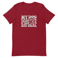 unisex red t-shirt with a funny animal saying "my dog thinks i'm kind of a big deal" in light gray wavy text with a smiley face