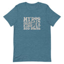 unisex teal blue t-shirt with a funny animal saying "my dog thinks i'm kind of a big deal" in light gray wavy text with a smiley face
