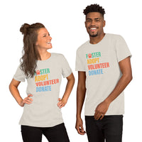 light beige t-shirt with colorful text 'Foster Adopt Volunteer Donate' to support animal shelter pets