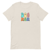 light beige women's t-shirt with simple cute "Dog Mom" text in bright 6 colors with floral accents for gift.