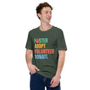 forest green t-shirt with colorful text 'Foster Adopt Volunteer Donate' to support animal shelter pets