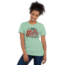 mint green unisex t-shirt with encouraging saying "it's okay to be different" in red, pink floral design