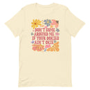 natural women's t-shirt with sarcastic saying "don't come around me if your dokies ain't okie" with boho pink, yellow floral design