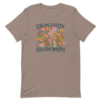 brown Unisex T-shirt with be yourself message "Grow Freely Bloom Wildly" in a field of wildflowers