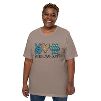 brown t-shirt with "peace love adopt" text for pet adoption and animal shelter supporters with peace sign, heart, paw print in teal and leopard print