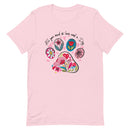 pink unisex t-shirt with dog lover saying "All You Need is Love and a Dog" with floral paw print for dog moms