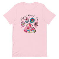 pink unisex t-shirt with dog lover saying "All You Need is Love and a Dog" with floral paw print for dog moms